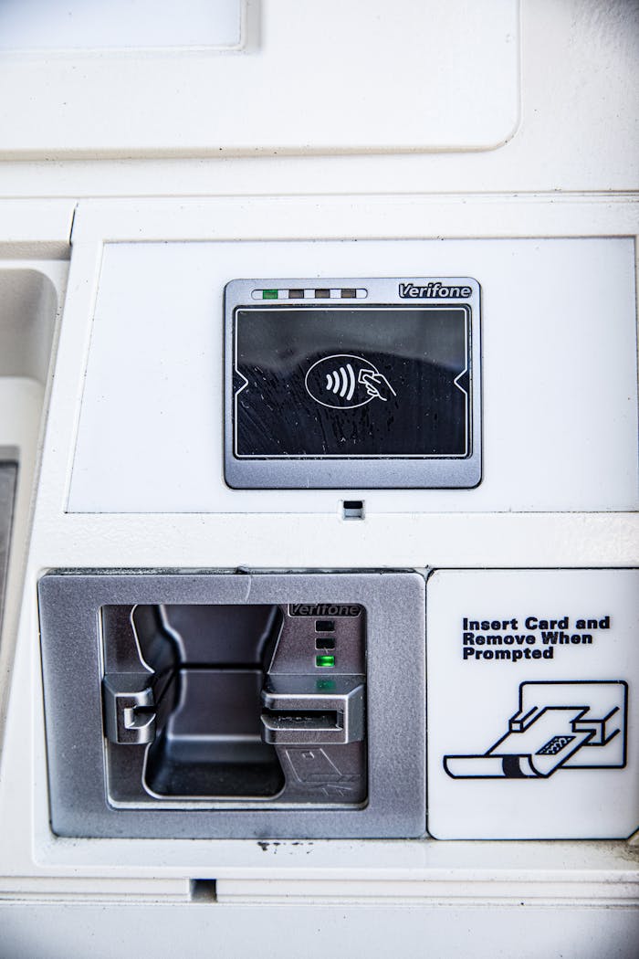 Detailed view of an ATM card slot highlighting security features and technology interface.